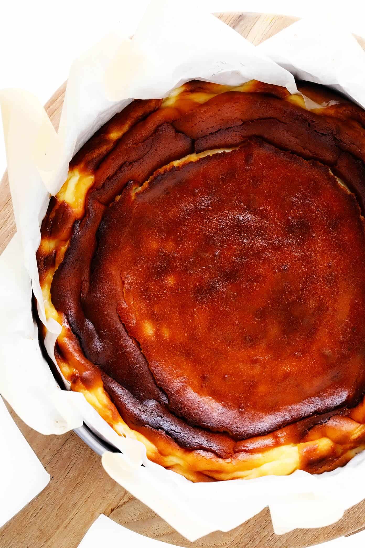 This "Burnt" Basque Cheesecake recipe (known here in Spain as 'tarta de queso') is uniquely light, creamy, delicious, caramelized, and so easy to make that it's nearly foolproof! Such a great dessert recipe for all occasions. | gimmesomeoven.com #basque #cheesecake #spanish #spain #sansebastian #dessert #tartadequeso #caramelized Basque Cheesecake Recipe in Springform Pan