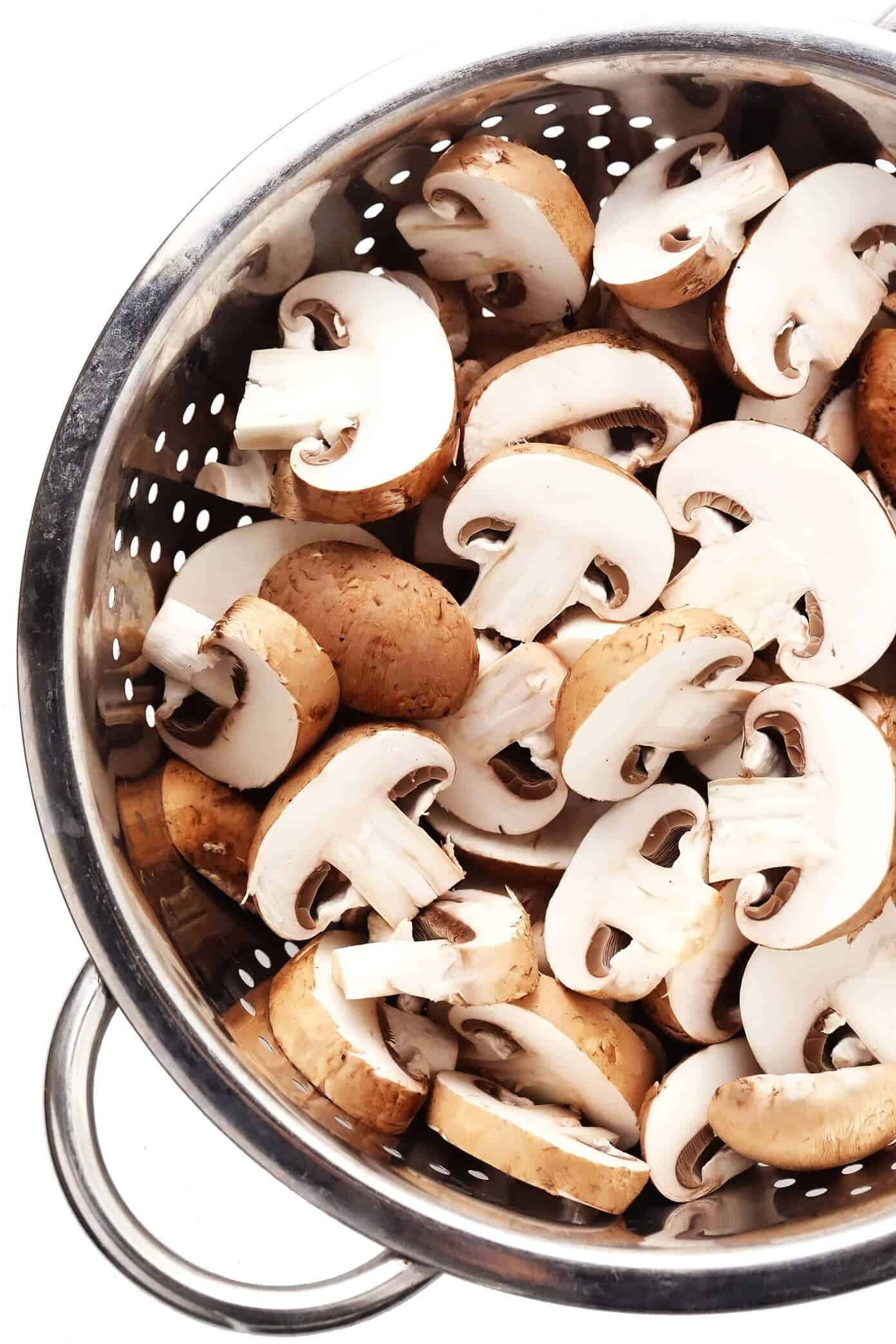 This creamy tuna mushroom pasta recipe is tossed with perfectly al dente pasta, sautéed mushrooms, tender spinach, canned tuna, and garlic lemon rosemary cream sauce. It's a super easy dinner recipe to make in just 30 minutes and taste SO delicious! | gimmesomeoven.com Sliced Baby Bella Mushrooms