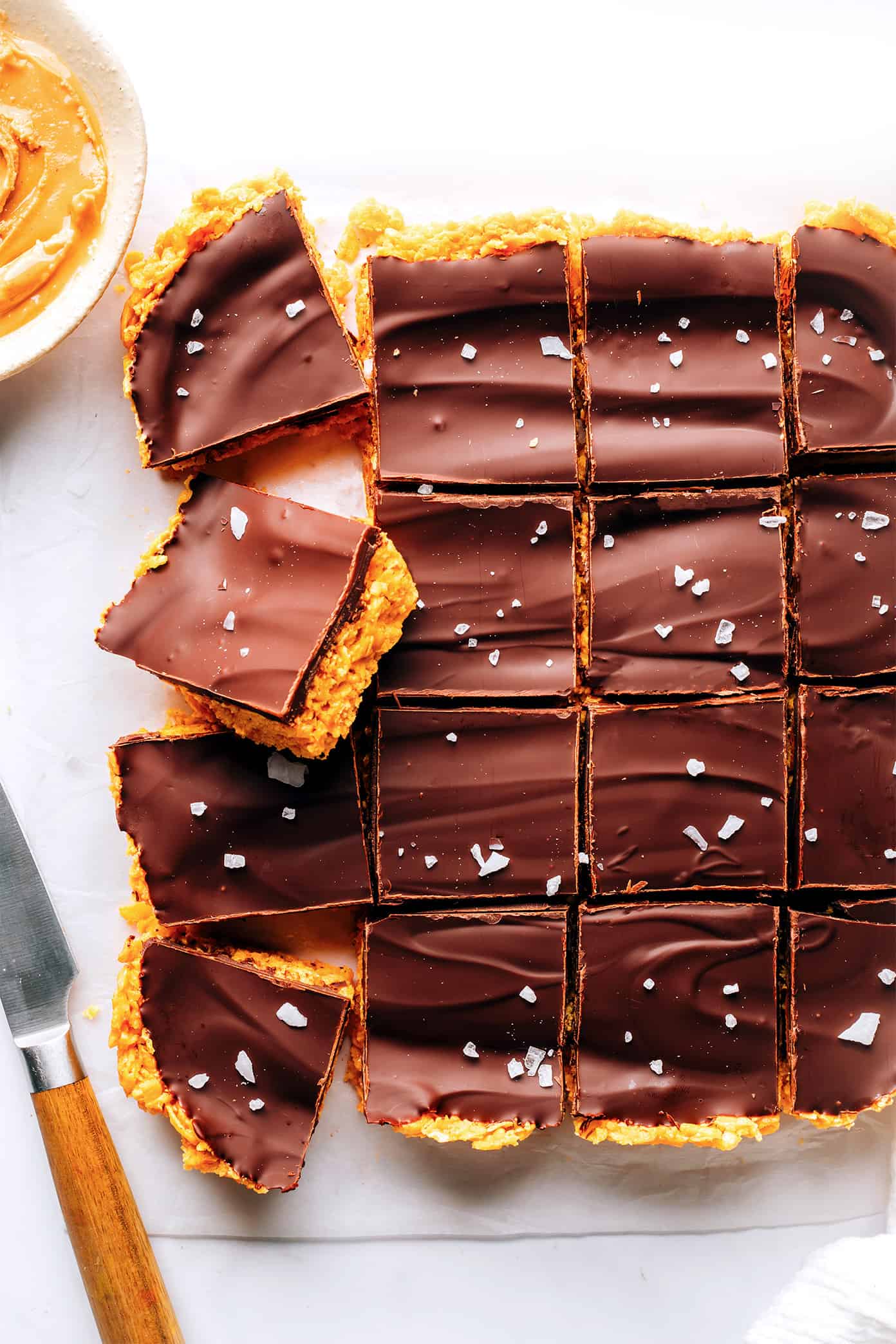 Chocolate peanut butter bars on cutting board