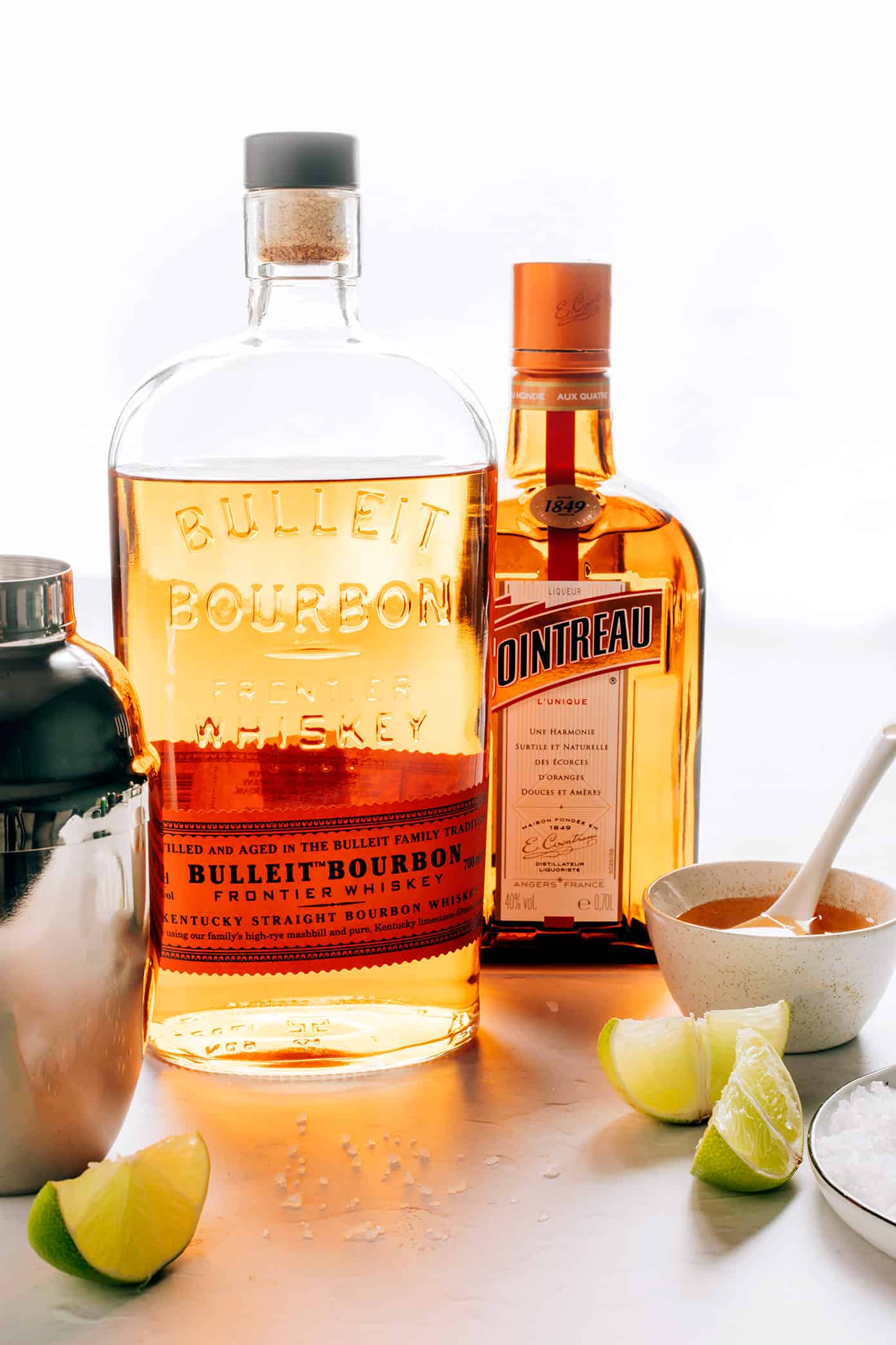 This bourbon margarita recipe swaps whiskey in place of the tequila in this classic cocktail...and it's so, so good. All you need is bourbon, freshly-squeezed lime juice, Cointreau (or your favorite orange liqueur), and maple syrup (optional sweetener) and this drink can be ready to enjoy in minutes. | gimmesomeoven.com Bourbon Margarita