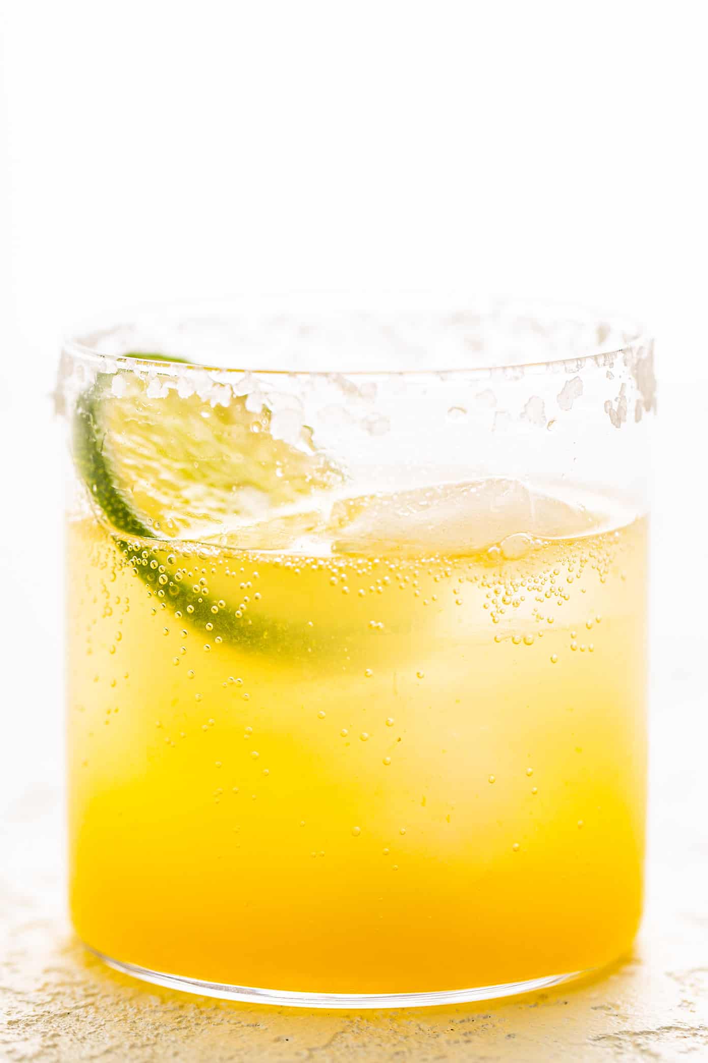 This virgin margarita mocktail recipe is quick and easy to make without alcohol, yet it's still so tangy, refreshing and delicious. Perfect to serve with your favorite Mexican food...or anytime you're craving a great mocktail! | gimmesomeoven.com Virgin Margarita Mocktail