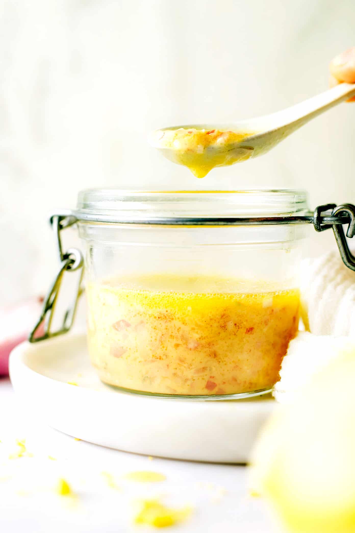 This delicious shallot vinaigrette (French vinaigrette) is quick and easy to make in 5 minutes with fresh lemon juice, garlic, Dijon, olive oil, salt and pepper. It's a versatile salad dressing that goes with just about everything, and always tastes so light and lovely. | gimmesomeoven.com French Vinaigrette in Jar