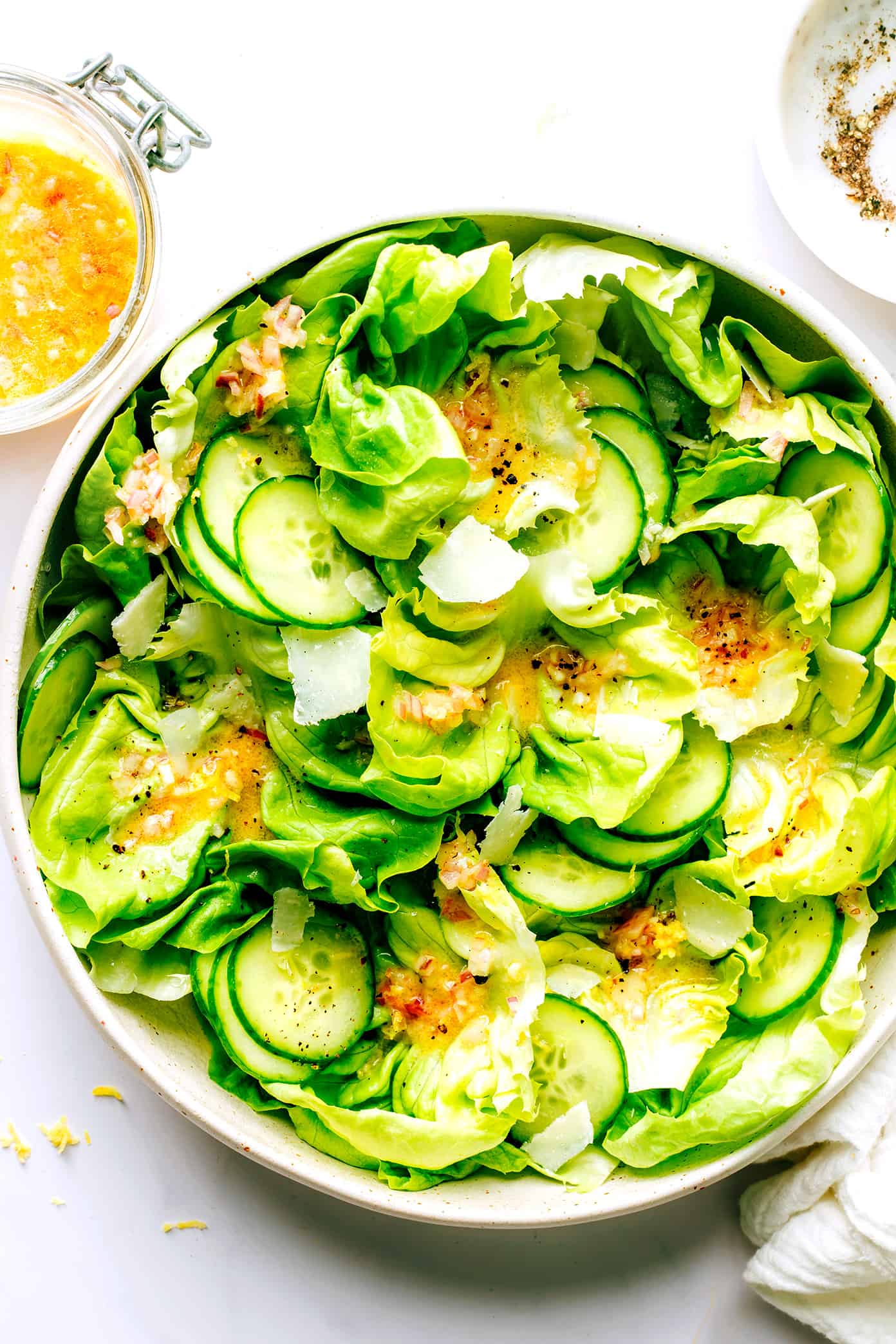 This delicious shallot vinaigrette (French vinaigrette) is quick and easy to make in 5 minutes with fresh lemon juice, garlic, Dijon, olive oil, salt and pepper. It's a versatile salad dressing that goes with just about everything, and always tastes so light and lovely. | gimmesomeoven.com Butter Lettuce Salad with Cucumber, Parmesan and Shallot Vinaigrette
