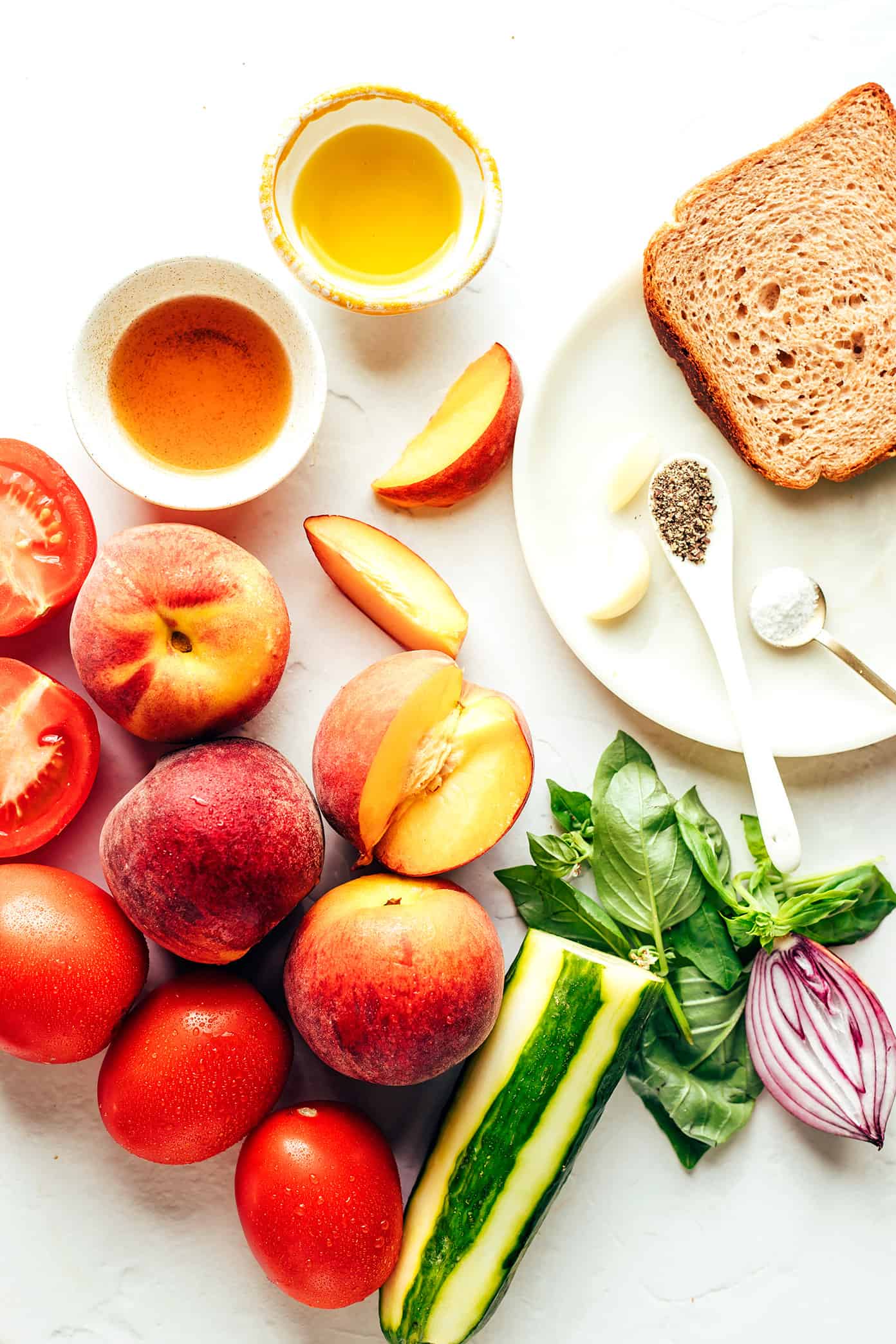 This fresh peach tomato gazpacho recipe features a delicious blend of sweet and savory flavors and comes together easily in just 10 minutes. It's the perfect cold soup for hot summer days, and always so delicious and refreshing! | gimmesomeoven.com Peach Gazpacho Ingredients