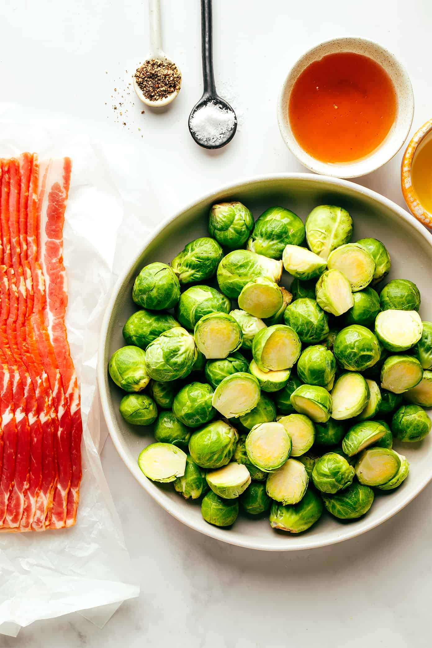 These bacon Brussels sprouts are easy to make and tossed with an irresistible drizzle of hot honey. The perfect side dish for Thanksgiving, dinner parties, or anytime you're just craving some extra-delicious vegetables. | gimmesomeoven.com Bacon Brussels Sprouts Ingredients