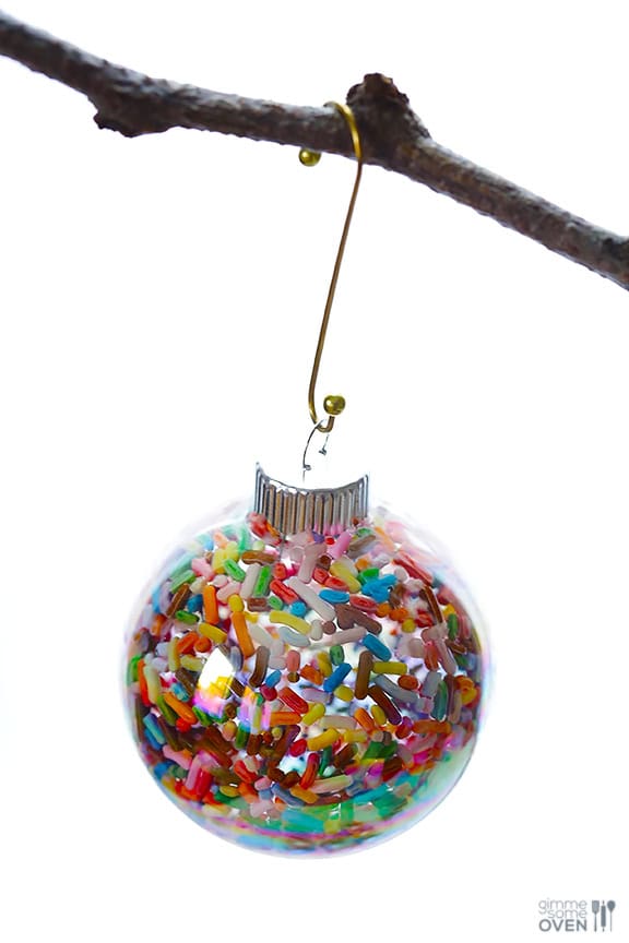 DIY Sprinkles Ornaments | gimmesomeoven.com/style #christmas #diy #ornament #sprinkles These DIY Sprinkles Ornaments are easy to make and customize with your favorite colors of sprinkles. The perfect homemade decor for your Christmas tree this year! | Gimme Some Oven