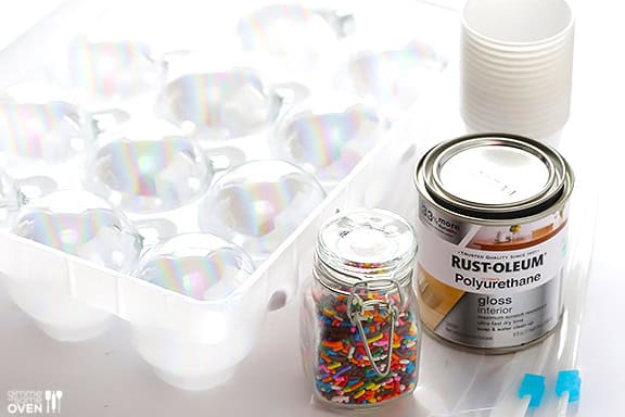 DIY Sprinkles Ornaments | gimmesomeoven.com/style #christmas #diy #ornament #sprinkles These DIY Sprinkles Ornaments are easy to make and customize with your favorite colors of sprinkles. The perfect homemade decor for your Christmas tree this year! | Gimme Some Oven